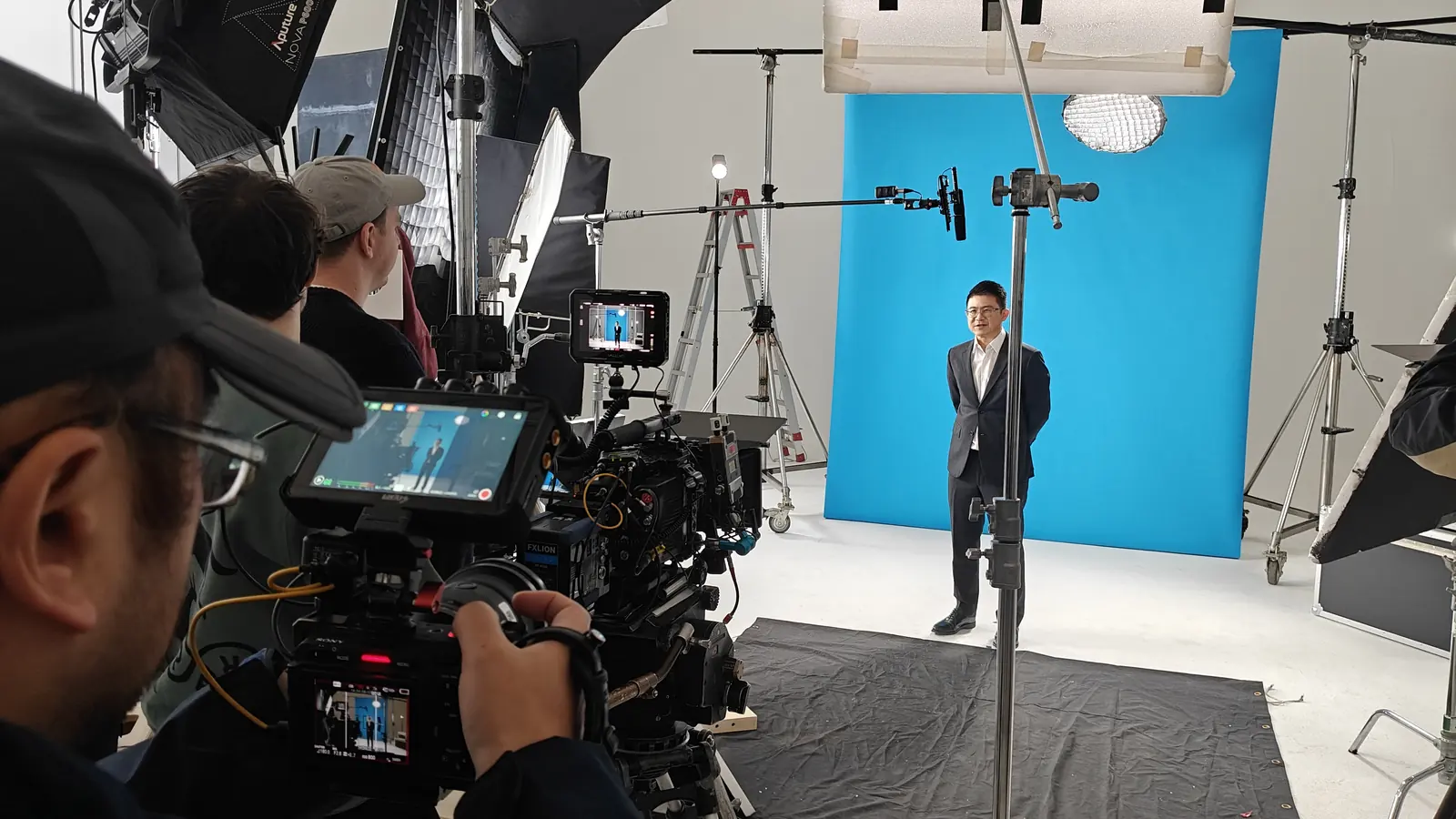 Camera crew filming a corporate production in Asia